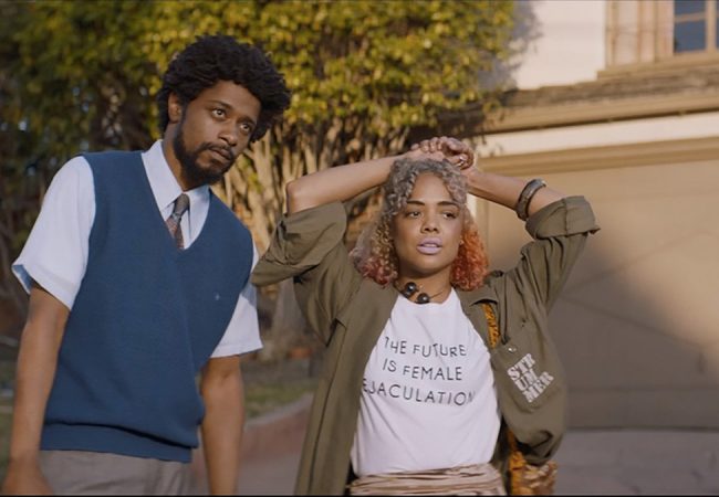 Lakeith Stanfield and Tessa Thompson appear in Sorry to Bother You by Boots Riley