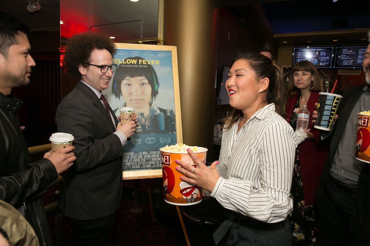 Glee reunion!! Josh Sussman (L) and Jenna Ushkowitz (R) share a laugh at the LA Premiere of"Yellow Fever." Photo credit: Gillian Perry.