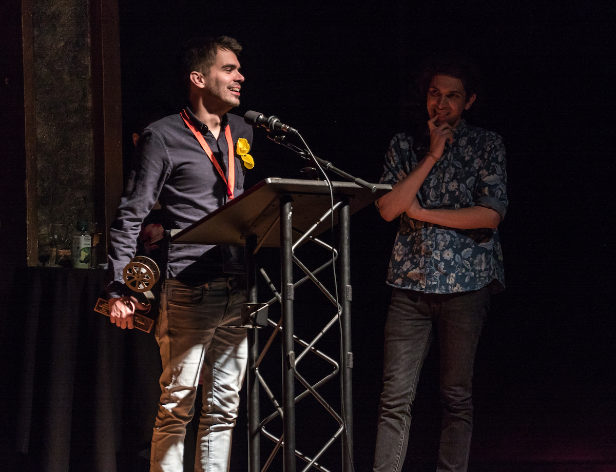 Director of América, Chase Whiteside, accepted the Les Blank Award: Best Feature Length Documentary. Photo by Darren Campbell/AIFF