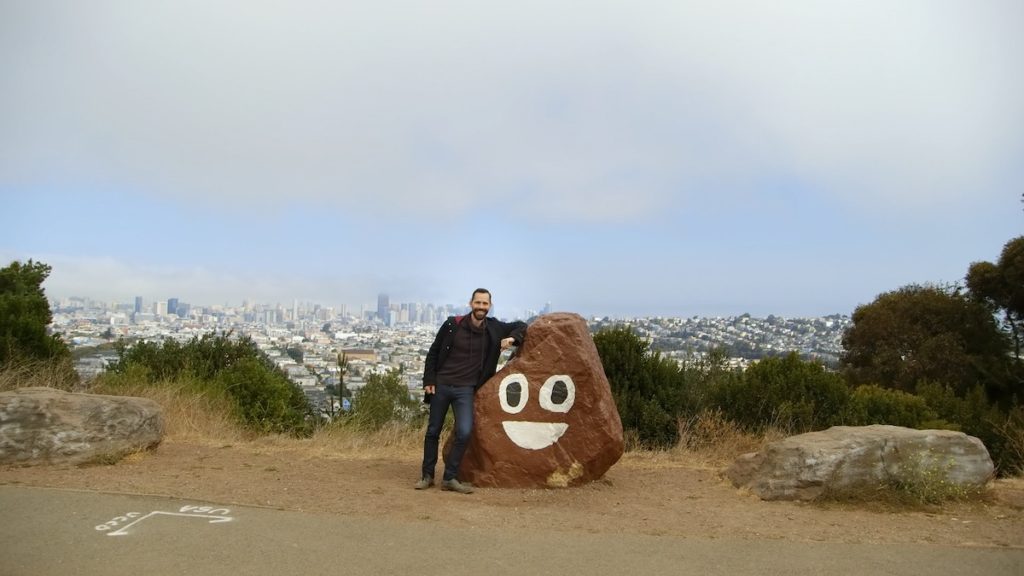 Picture Character. Linguist Tyler Schnoebelen with San Francisco’s beloved poop rock.