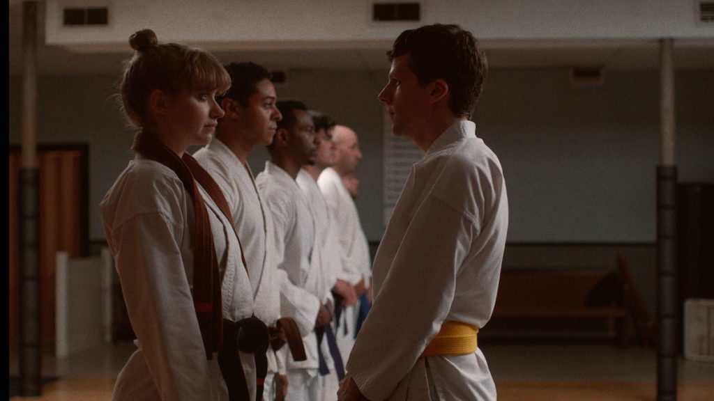 Imogen Poots (left) as "Anna" and Jesse Eisenberg (right) as “Casey” in writer/director Riley Stearn’s THE ART OF SELF-DEFENSE, a Bleecker Street release. Credit: Bleecker Street