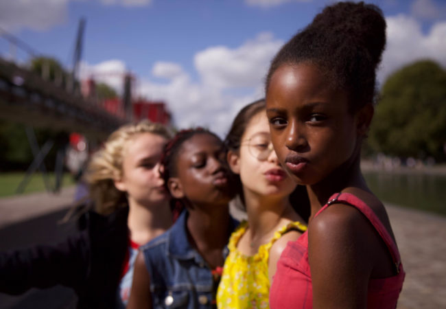 Fathia Youssouf, Medina El Aidi-Azouni, Esther Gohourou, Ilanah Cami-Goursolas, Myriam Hamma, Demba Diaw, and Maimouna Gueye appear in "Cuties" by Maïmouna Doucouré, an official selection of the World Cinema Dramatic Competition at the 2020 Sundance Film Festival. Courtesy of Sundance Institute. 'Courtesy of Sundance Institute.'