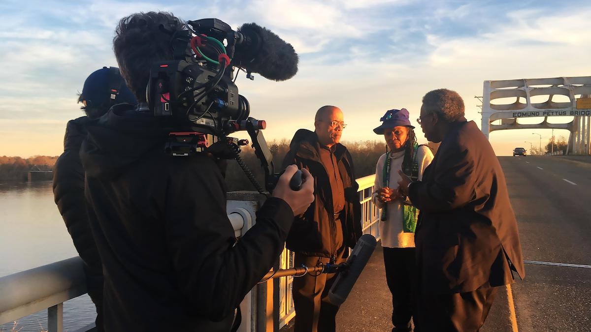 Who We Are: A Chronicle of Racism in America. Jeffery Robinson with civil rights activist and lawyer Faya Ora Rose Touré and Senator Henry"Hank" Sanders on the Edmund Pettus Bridge in Selma, Alabama.