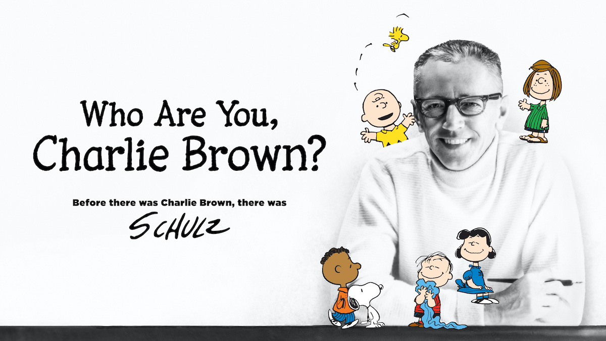 Charles M. Schulz pictured with his beloved Peanuts characters in"Who Are You, Charlie Brown?”