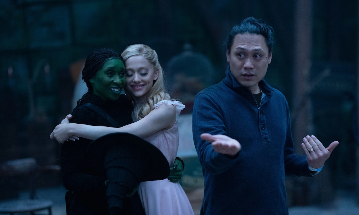 Jon M. Chu on the set of Wicked with Cynthia Erivo, Ariana Grande 