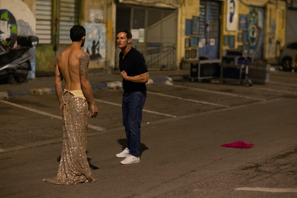 A Man Walks Down the Street